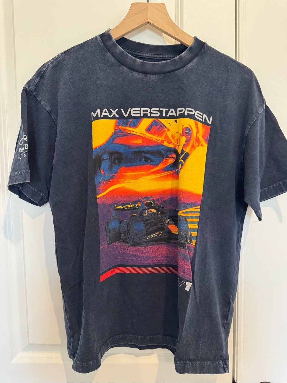 American Eagle Outfitters Black Tee with Vibrant Racing Graphic
